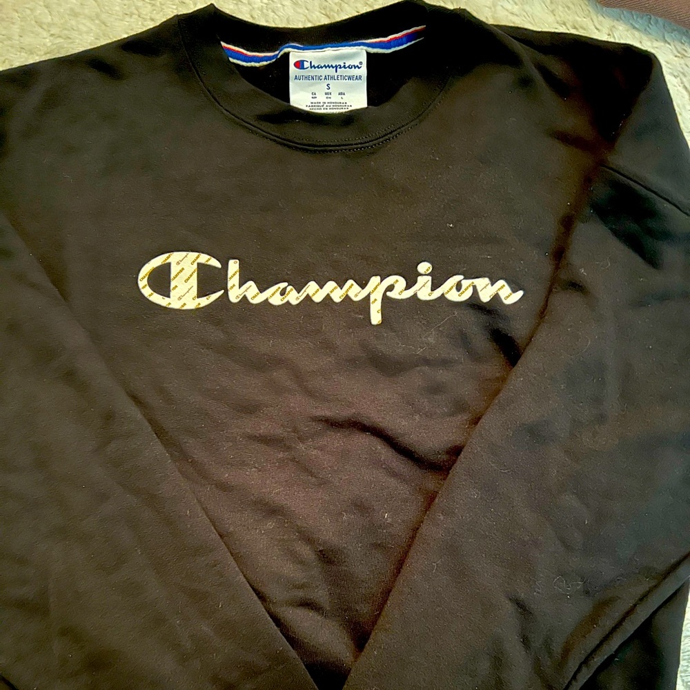 Women’s small black champion sweater. Like new.
